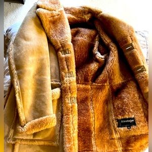 Men/woman’s coat size 42 and 3 pair of men’s shoes